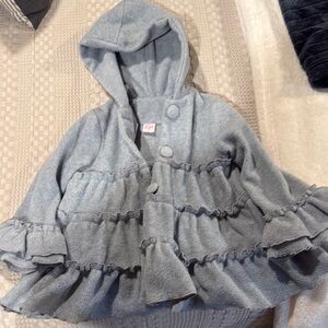 Ricrac and ruffles peacoat